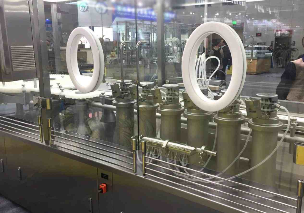 peristaltic pump filling system requiring low pulsation fluid transfer